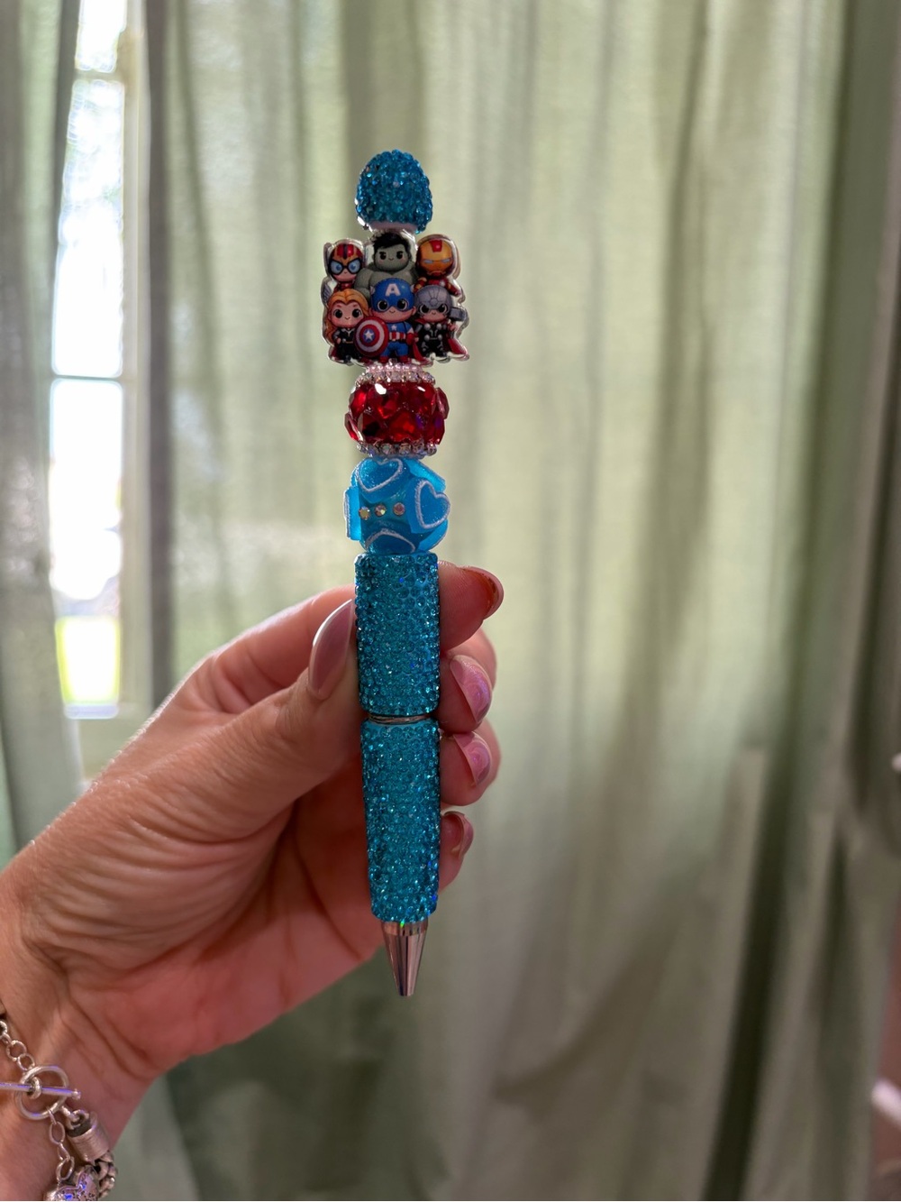 Bedazzled marvel Beaded Blue Novelty Ballpoint Pen with acrylic topper.